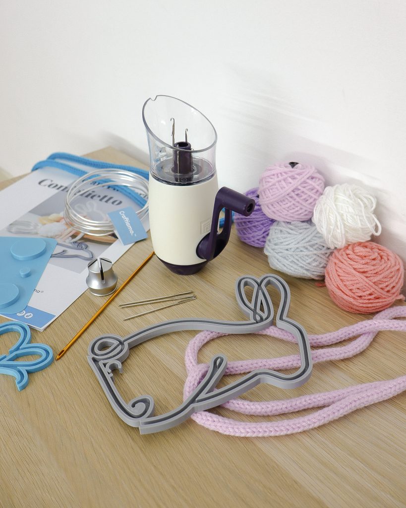 Complete Tricotin Starter Kit with Prym tricotin knitter, shaping frames, yarns, and accessories to start creating with the tricotin and FiloForma&reg; techniques.